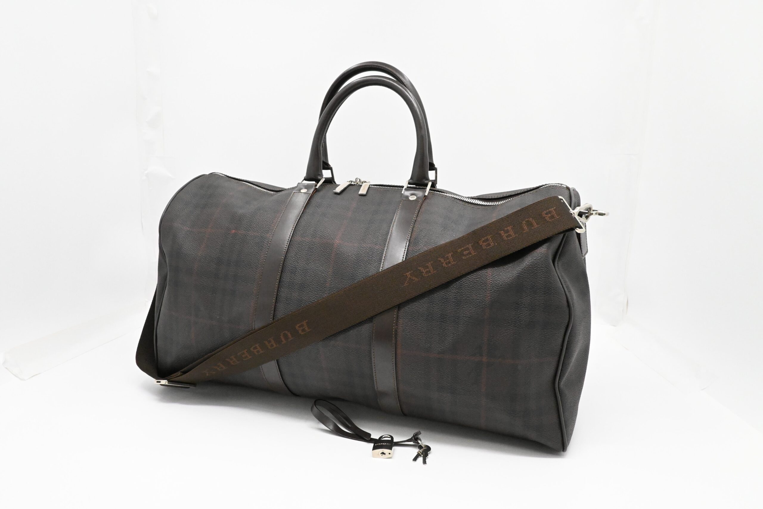 Burberry Travel Bag in Brown Checked Coated Canvas