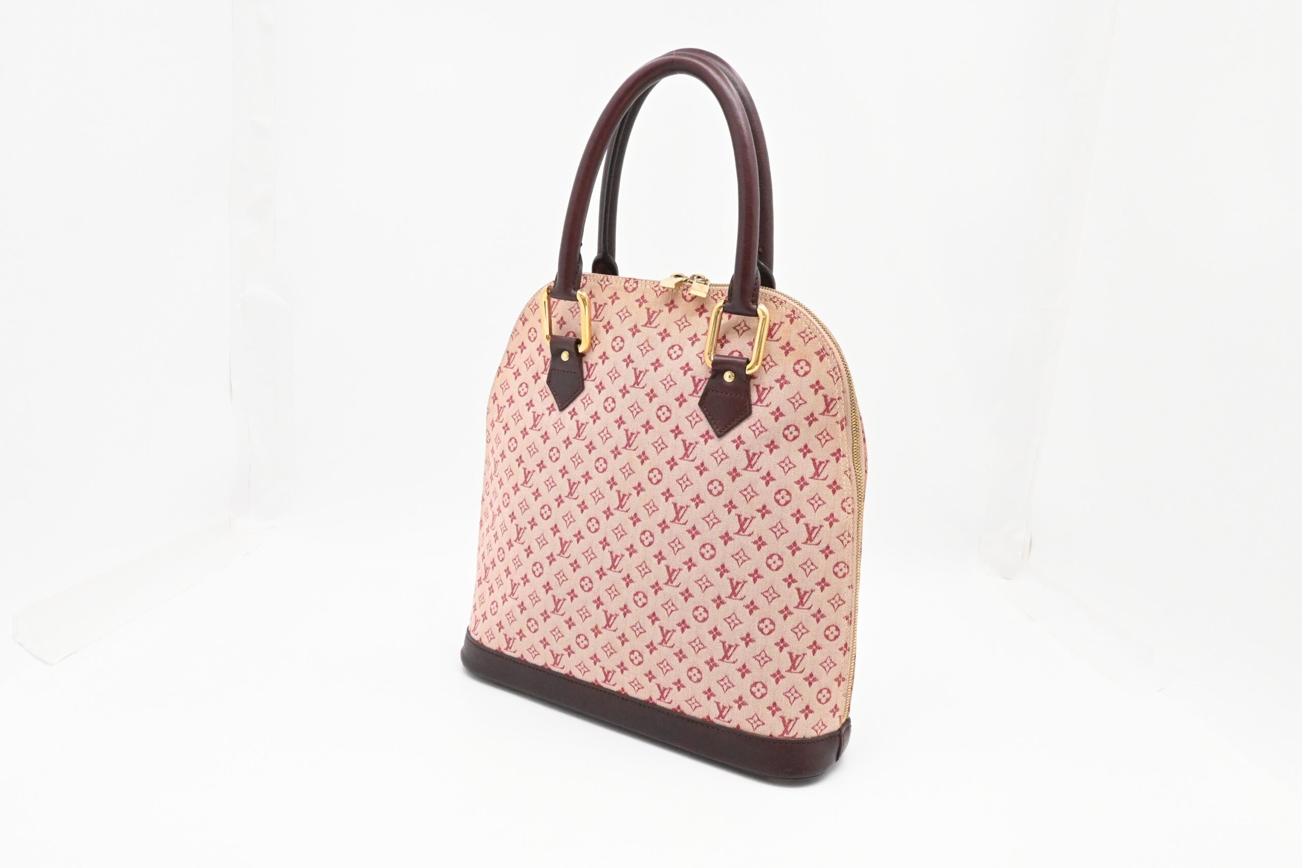 Louis Vuitton Alma Haut in Sepia Minilin Canvas
